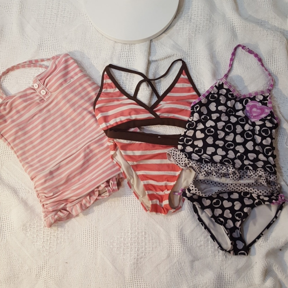 Three beautiful little girl swimsuits
